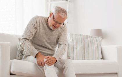 Elder man is having a knee pain