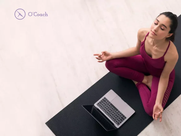 Girl is doing yoga routine with the help of O'Coach fitness app