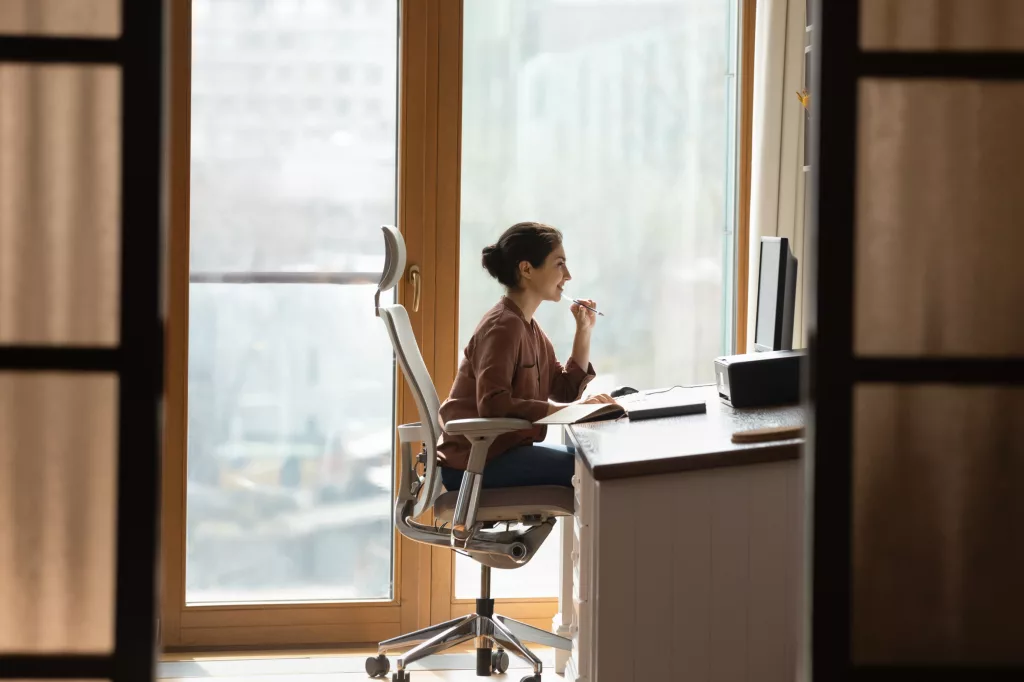 girl is sitting in good chair