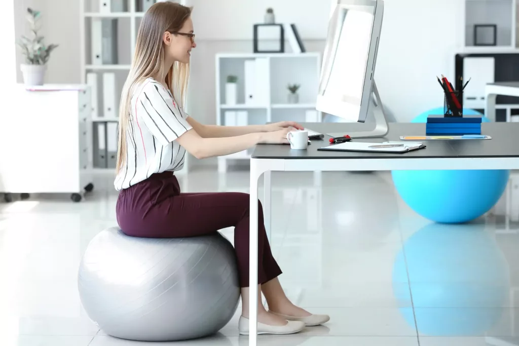 girl is sitting in good posture