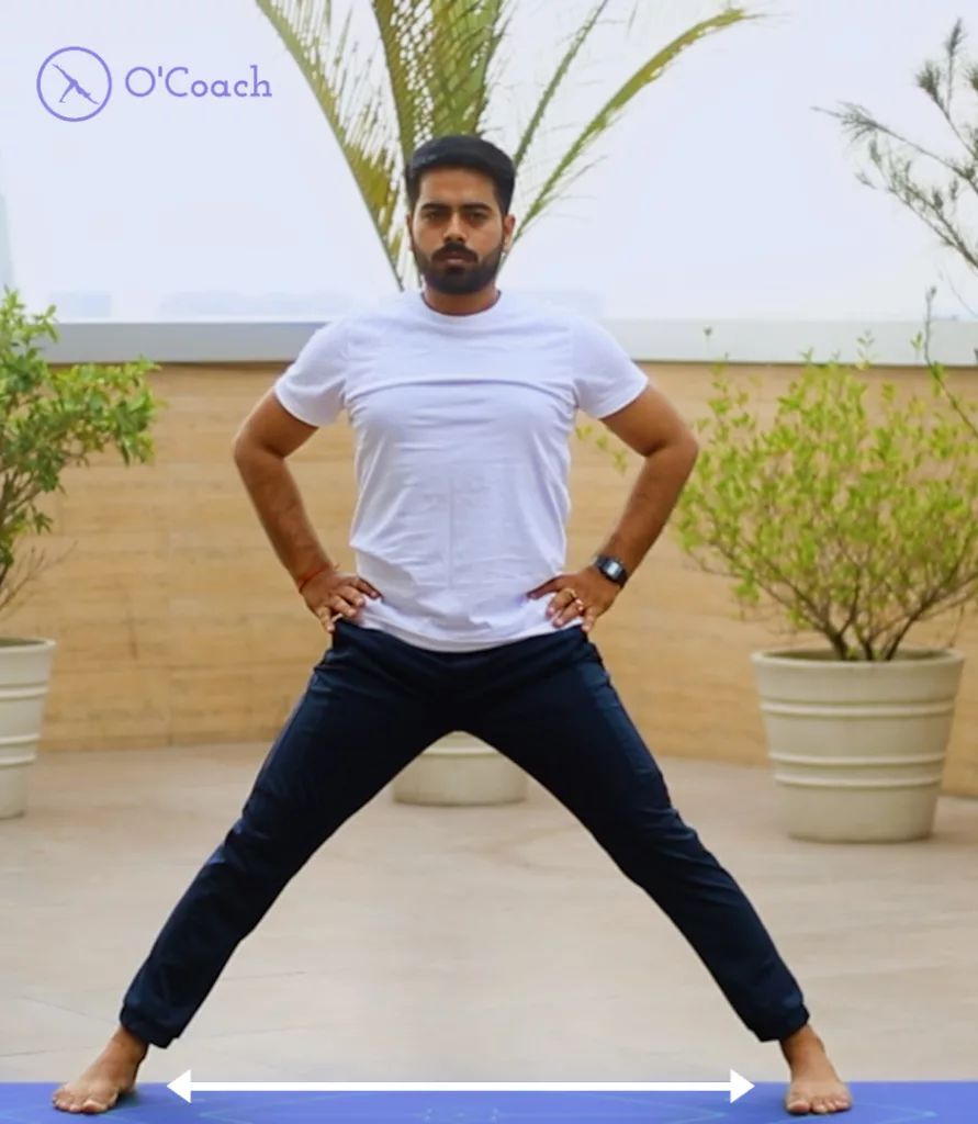 Boy is performing Trikonasana