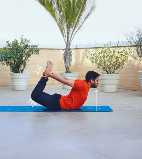 yoga professional is doing Bow pose