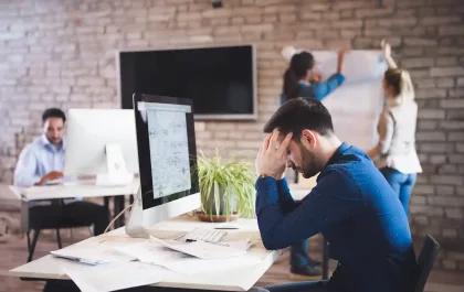 A Busy Professional Managing Stress and Anxiety at His Office