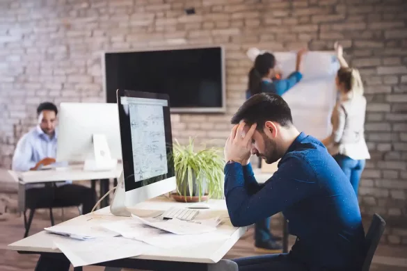 A Busy Professional Managing Stress and Anxiety at His Office