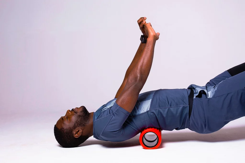 Top 10 Foam Roller Exercises to Enhance Your Fitness Routine O Coach Blog HIIT Yoga Rehab Custom Workout Plans Self Training App